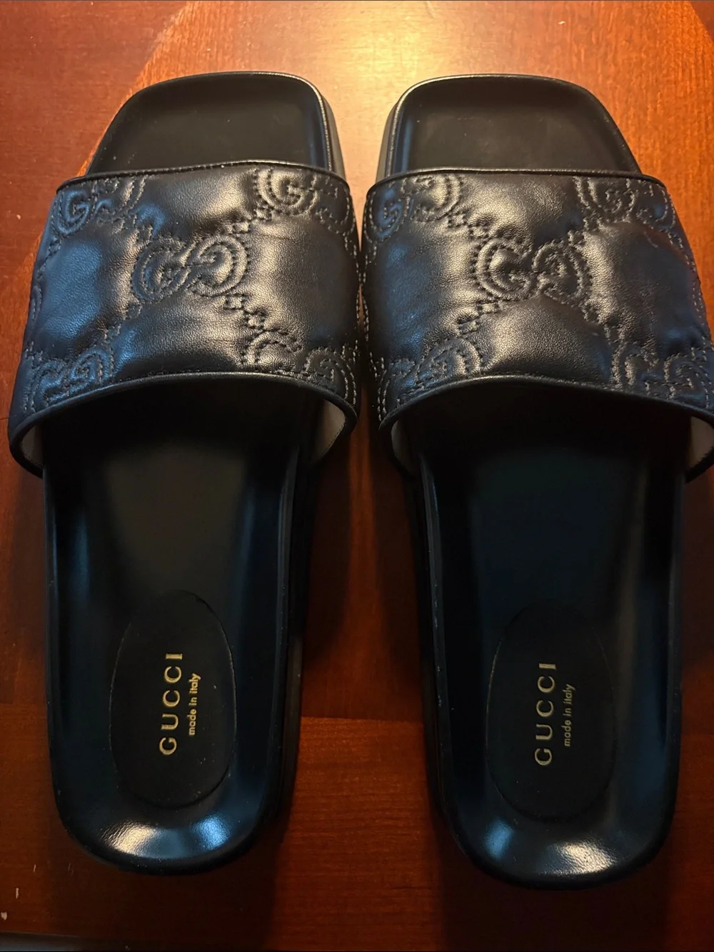 Gucci Black Embossed Logo Slide Sandals